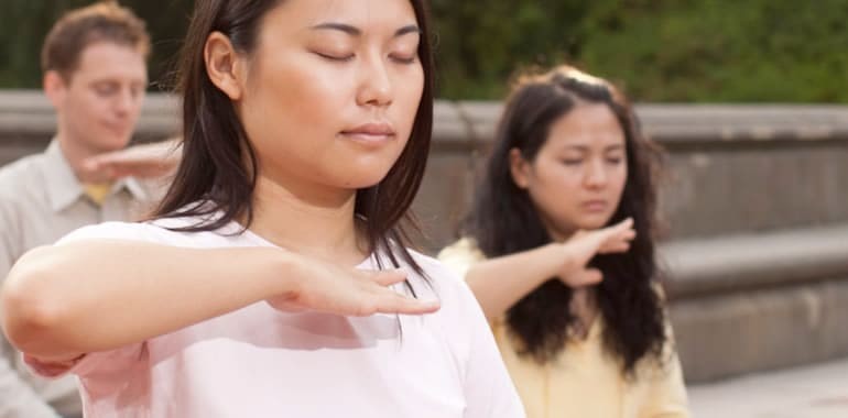 Proper diaphragmatic breathing technique demonstrating correct posture for deep breathing